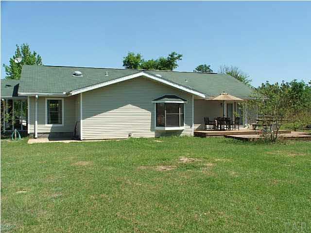 9493 Hay Meadow Road Milton, FL 32583 - Photo 13 of 24 Master Bedroom has French Doors to Deck