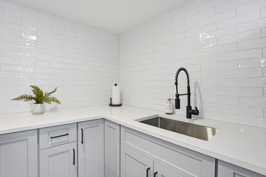 82 Water Street Saugus, MA 01906 - Photo 25 of 40 a close view of sink and tap