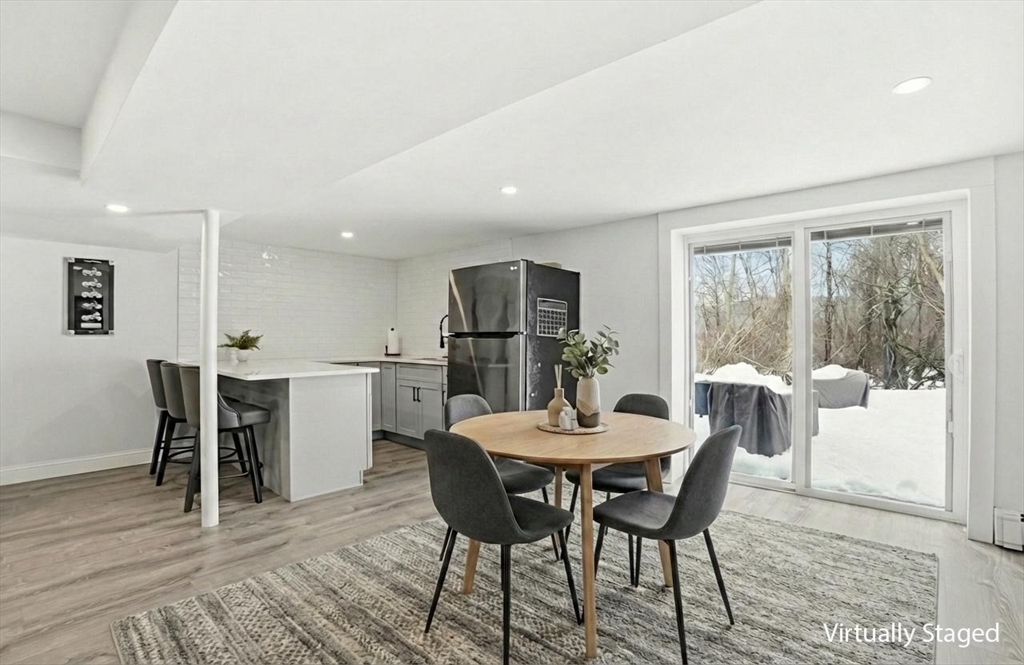 82 Water Street Saugus, MA 01906 - Photo 29 of 40 a view of a dining room with furniture window and wooden floor