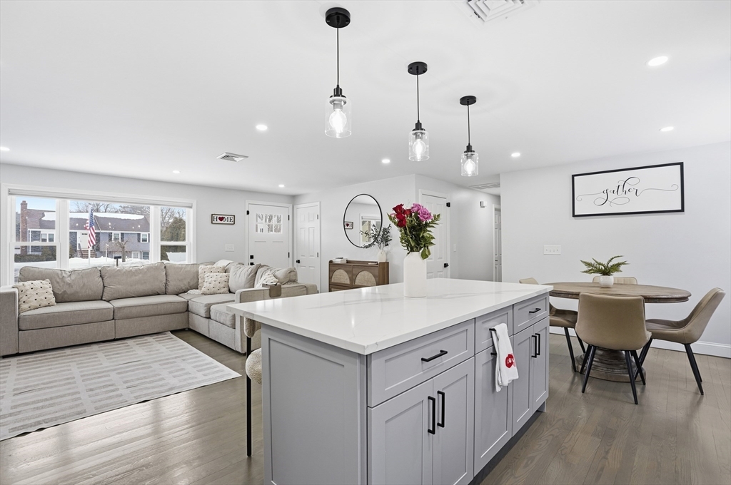 82 Water Street Saugus, MA 01906 - Photo 10 of 40 a living room with furniture and a table