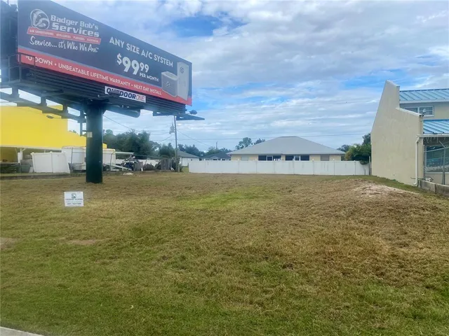 a view of an ocean & house