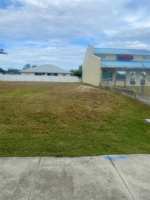 3782 North Access Road Englewood, FL 34224 - Photo 3 of 3 a view of building with ocean view