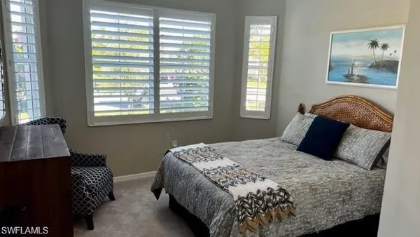 a view of workspace with a table and chairs