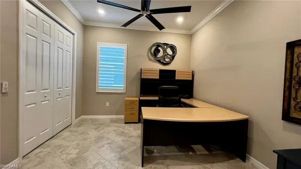 a bathroom with a sink a large mirror and a bathtub