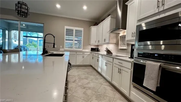 a group of people sitting in living room