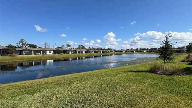 a view of a lake with houses