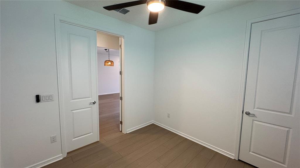 9408 Coastline Way Palmetto, FL 34221 - Photo 21 of 41 an empty room with closet