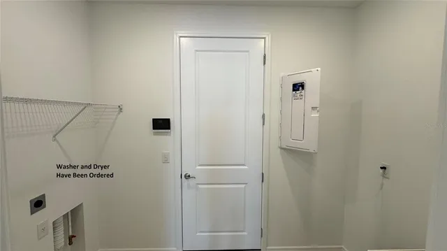 a view of livingroom with furniture and a chandelier