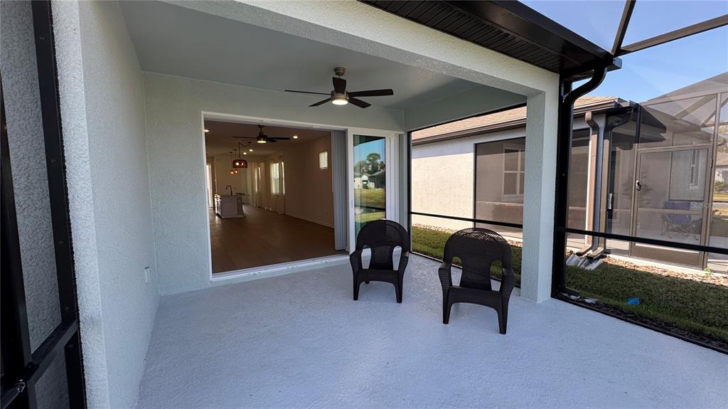 9408 Coastline Way Palmetto, FL 34221 - Photo 26 of 41 a view of livingroom with furniture and a chandelier