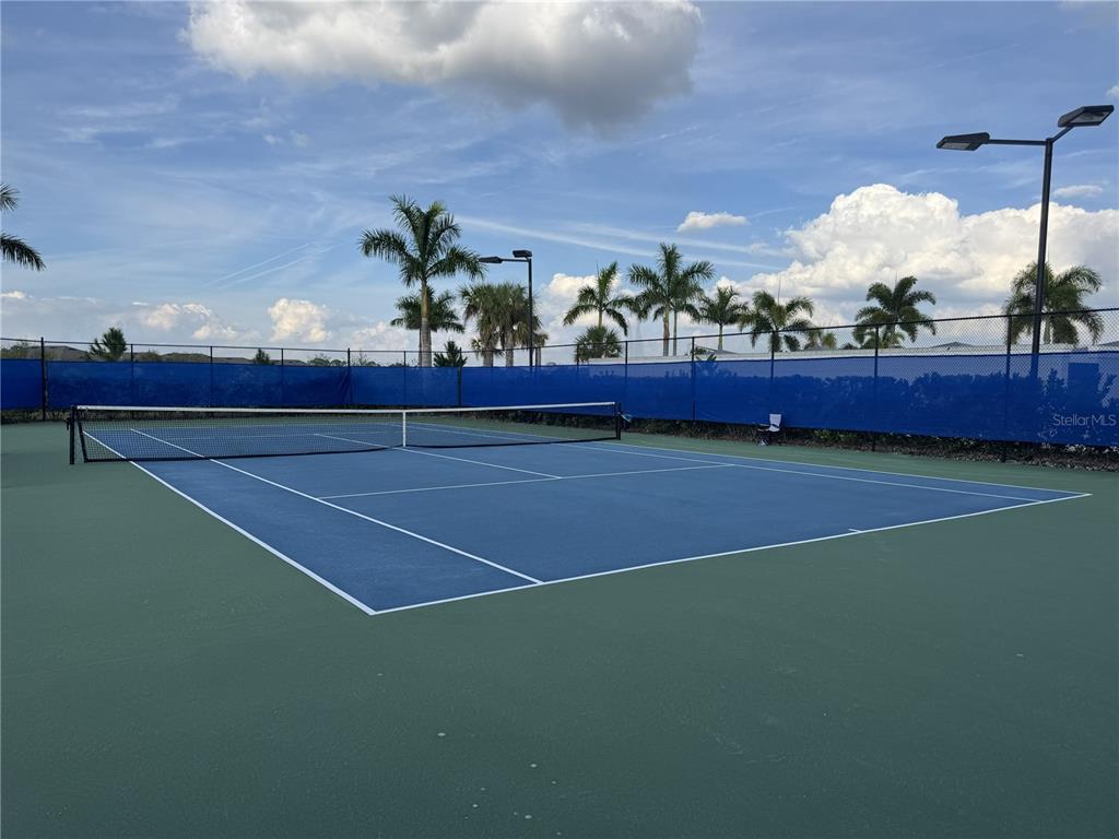 9408 Coastline Way Palmetto, FL 34221 - Photo 34 of 41 a view of a tennis court