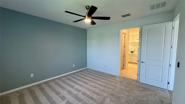 an empty room and closet area