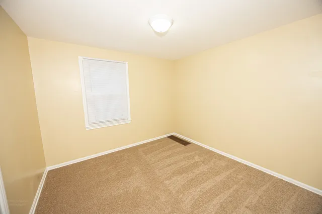 a view of a small space with a window