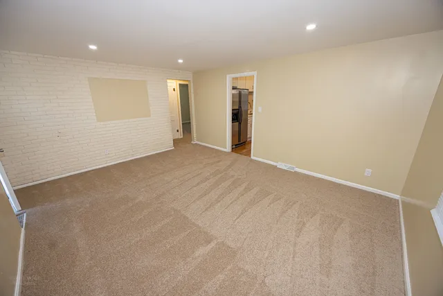 an empty room with a natural light