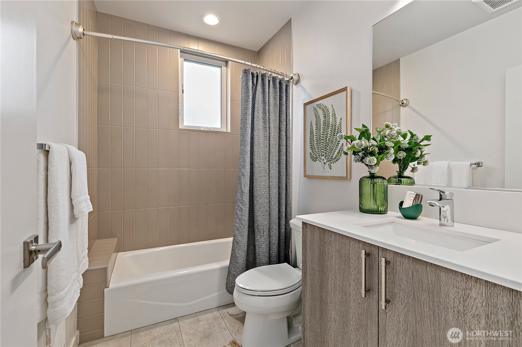 4100 37th Avenue South Seattle, WA 98118 - Photo 12 of 19 a bathroom with a sink toilet and shower