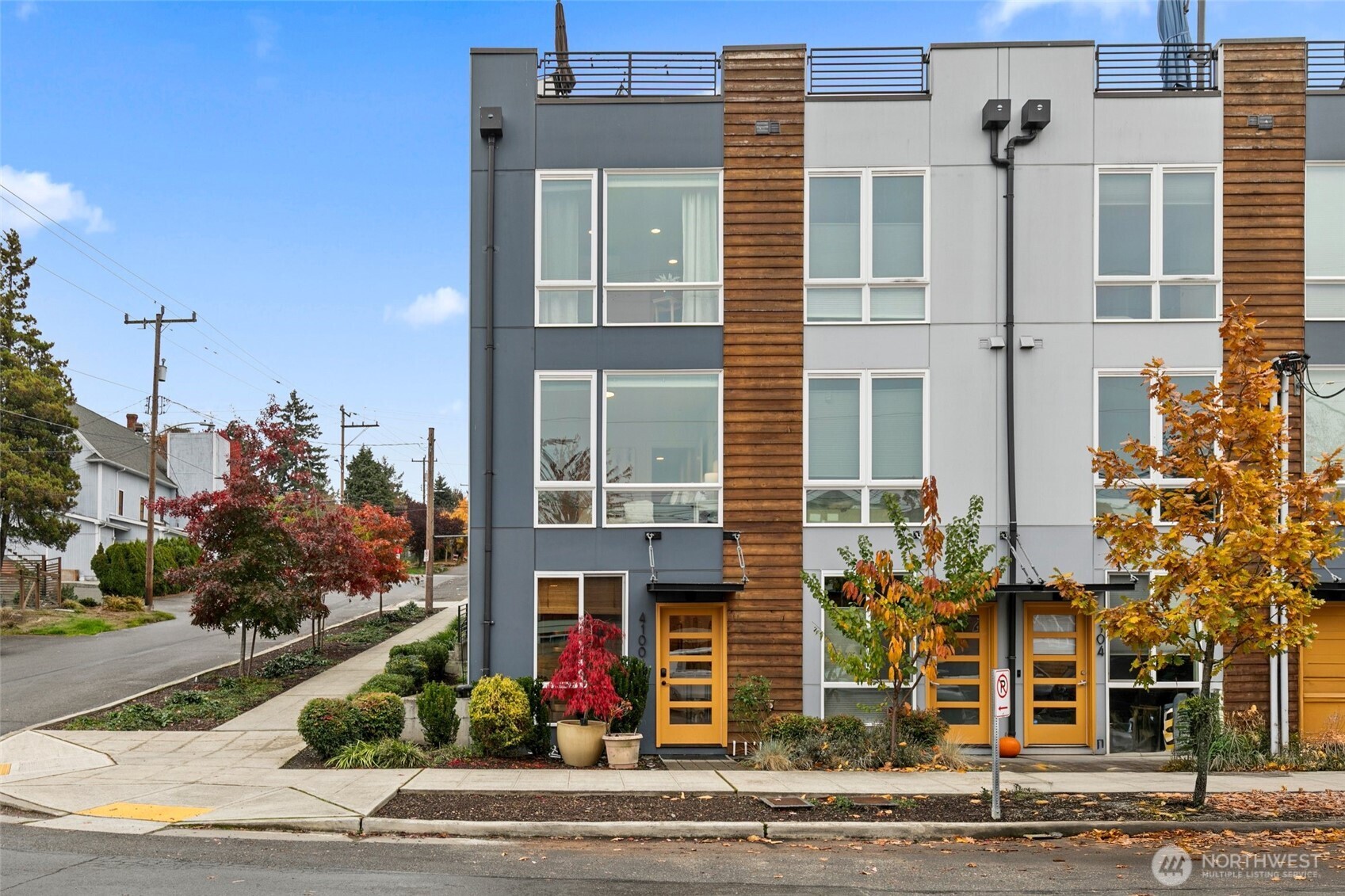 4100 37th Avenue South Seattle, WA 98118 - Photo 2 of 19 front view of a building with a street
