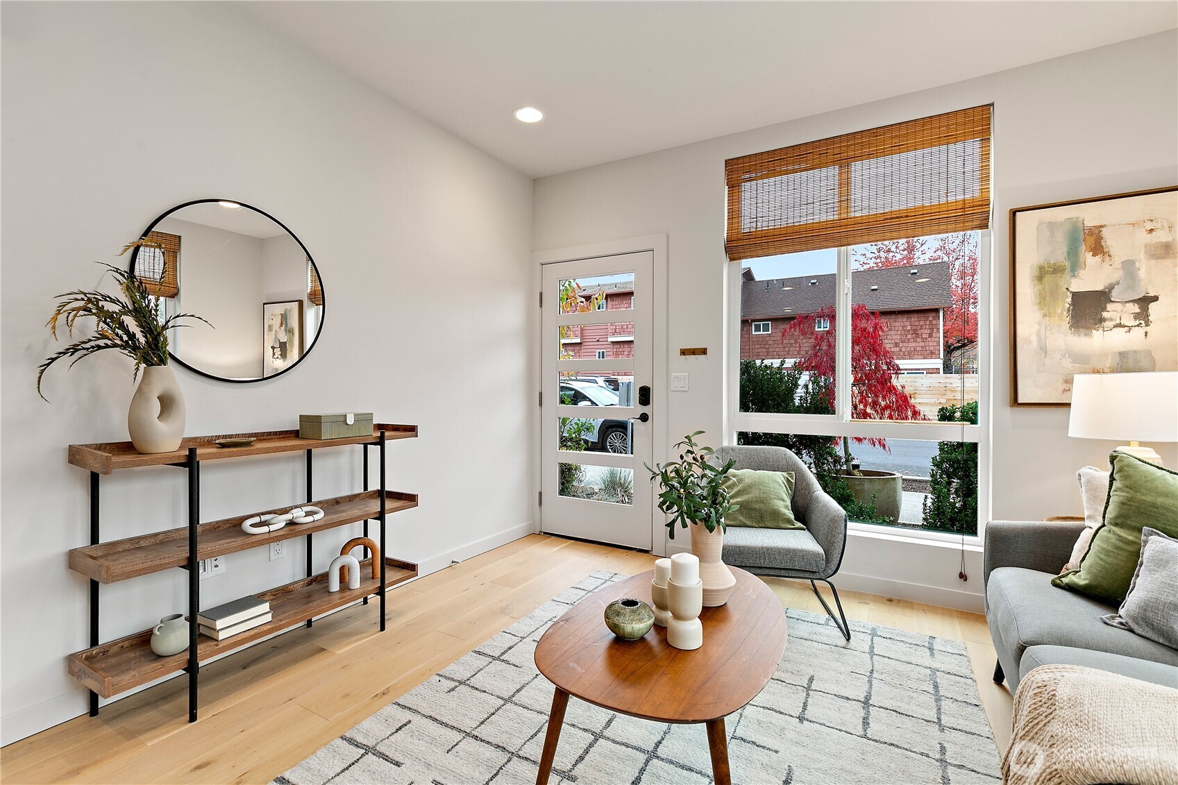 4100 37th Avenue South Seattle, WA 98118 - Photo 5 of 19 a living room with furniture a rug and a large window