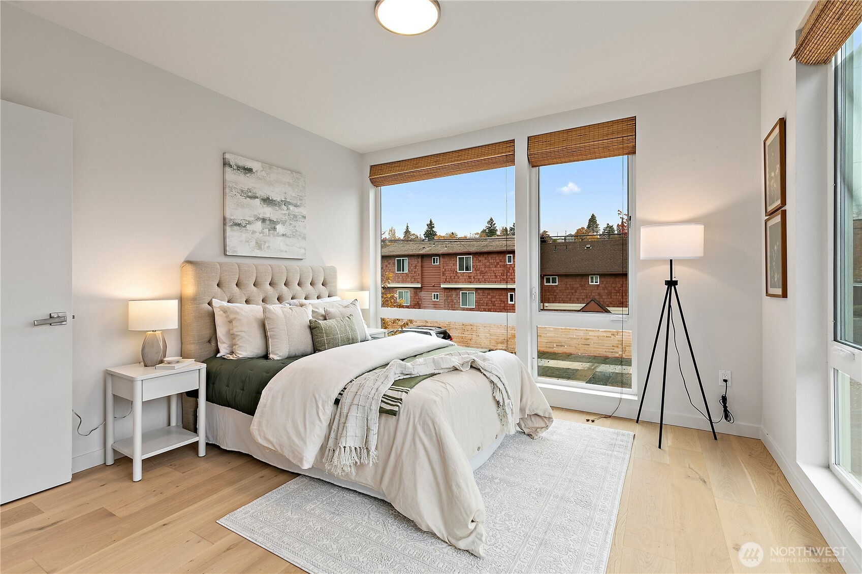 4100 37th Avenue South Seattle, WA 98118 - Photo 10 of 19 a bedroom with a bed and a window