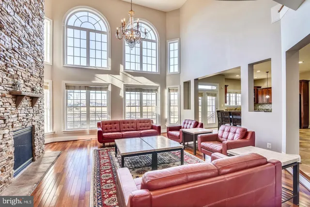 a kitchen with granite countertop a stove oven and refrigerator