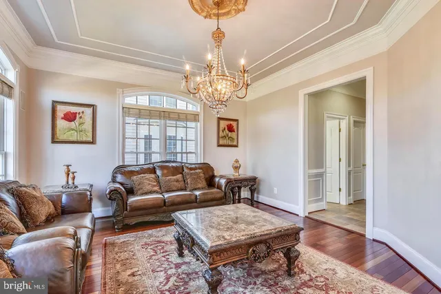 a spacious bedroom with a bed and a window