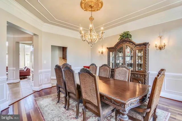 a living room with furniture a rug and a large window