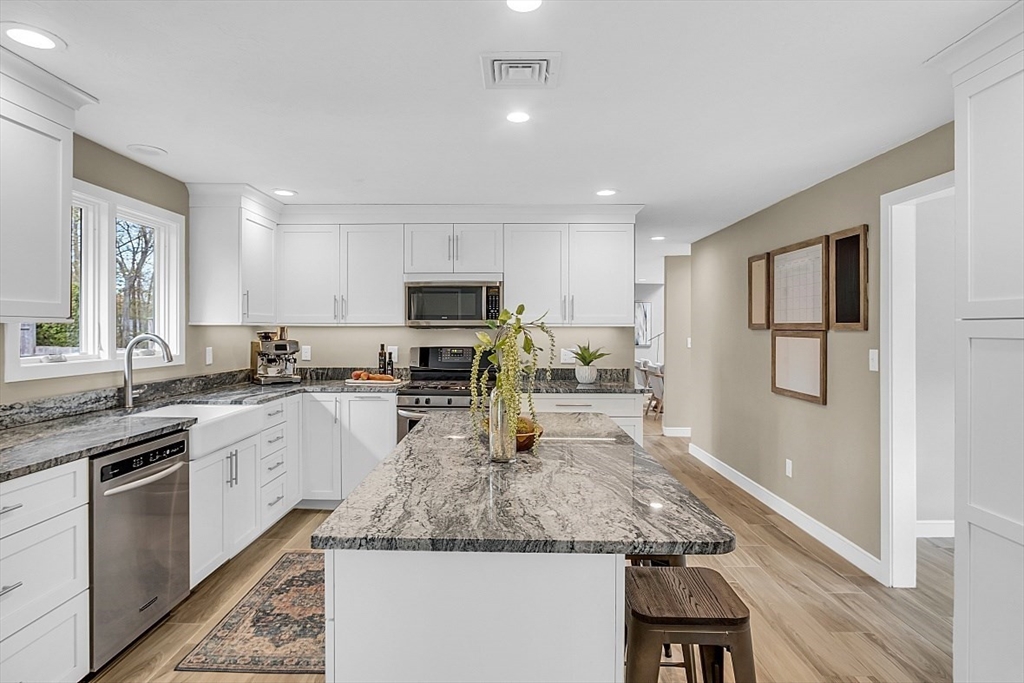 35 Wadsworth Road Ashland, MA 01721 - Photo 11 of 32 a kitchen with sink refrigerator and microwave