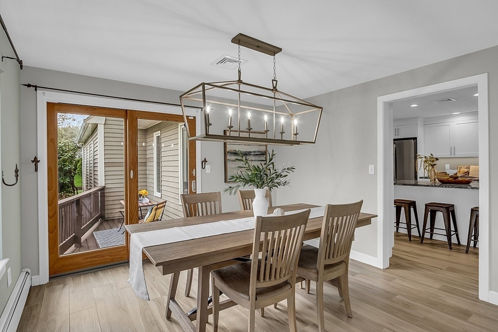 35 Wadsworth Road Ashland, MA 01721 - Photo 13 of 32 a view of a dining room with furniture window and wooden floor
