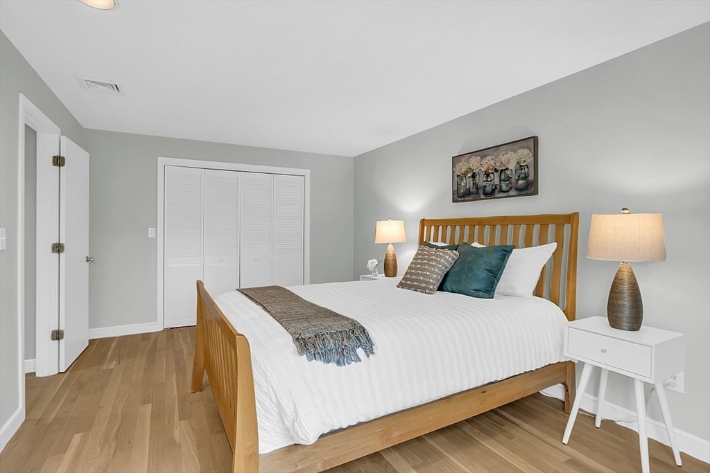 35 Wadsworth Road Ashland, MA 01721 - Photo 24 of 32 a bedroom with a bed and a night stand
