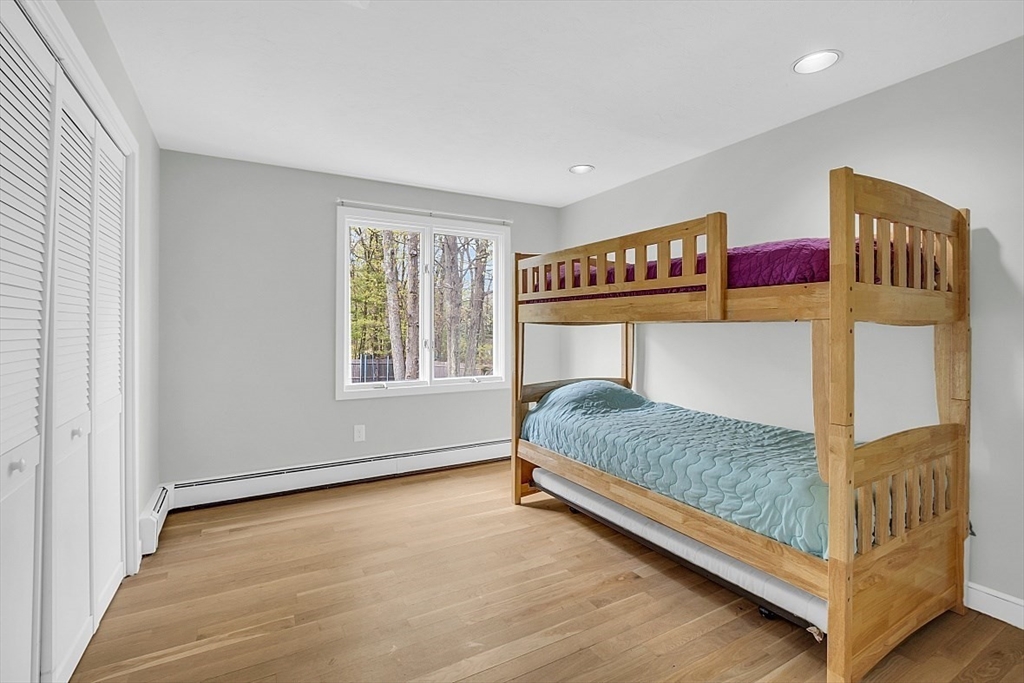 35 Wadsworth Road Ashland, MA 01721 - Photo 25 of 32 a bedroom with a bed and window