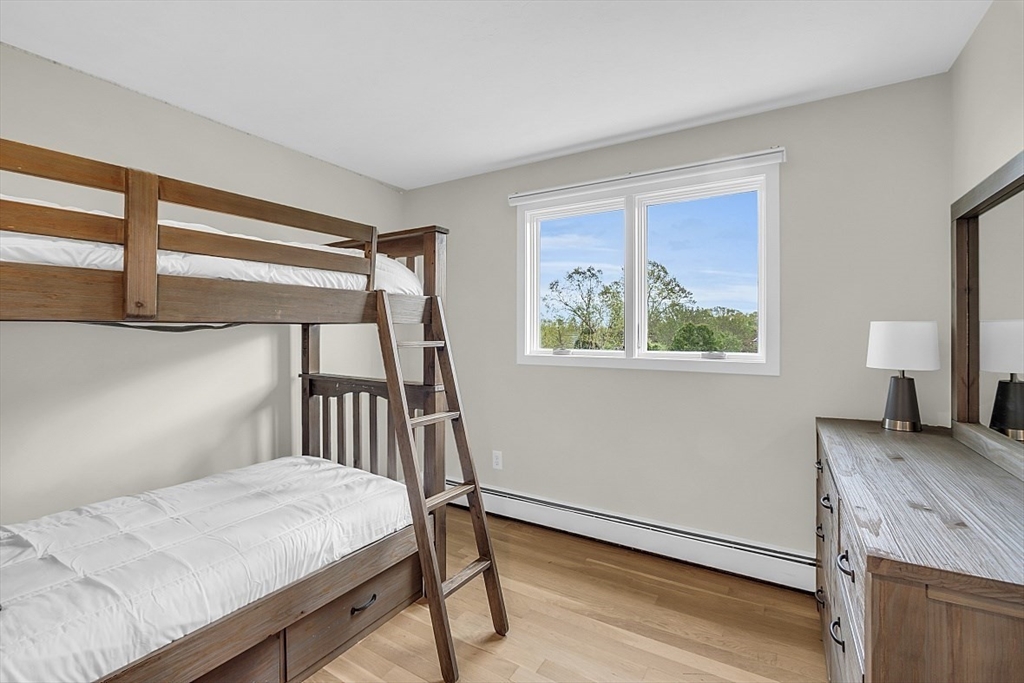 35 Wadsworth Road Ashland, MA 01721 - Photo 26 of 32 a bedroom with a bed and a window