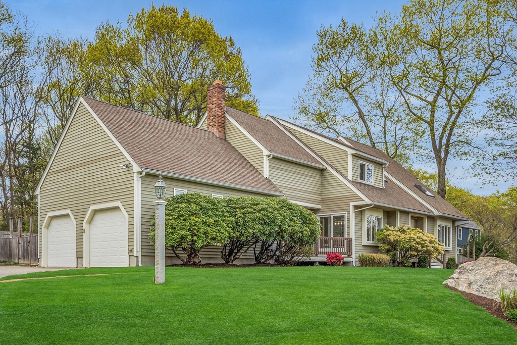 35 Wadsworth Road Ashland, MA 01721 - Photo 3 of 32 a view of a house with a big yard and potted plants