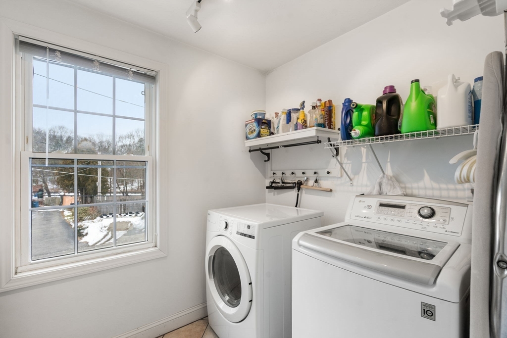 21 Hartwell Place, Unit 21 Canton, MA 02021 - Photo 26 of 33 a utility room with dryer and washer