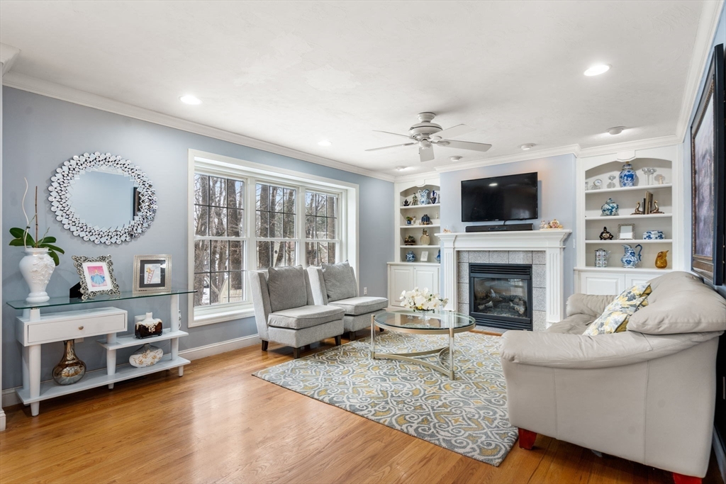 21 Hartwell Place, Unit 21 Canton, MA 02021 - Photo 3 of 33 a living room with furniture and a fireplace
