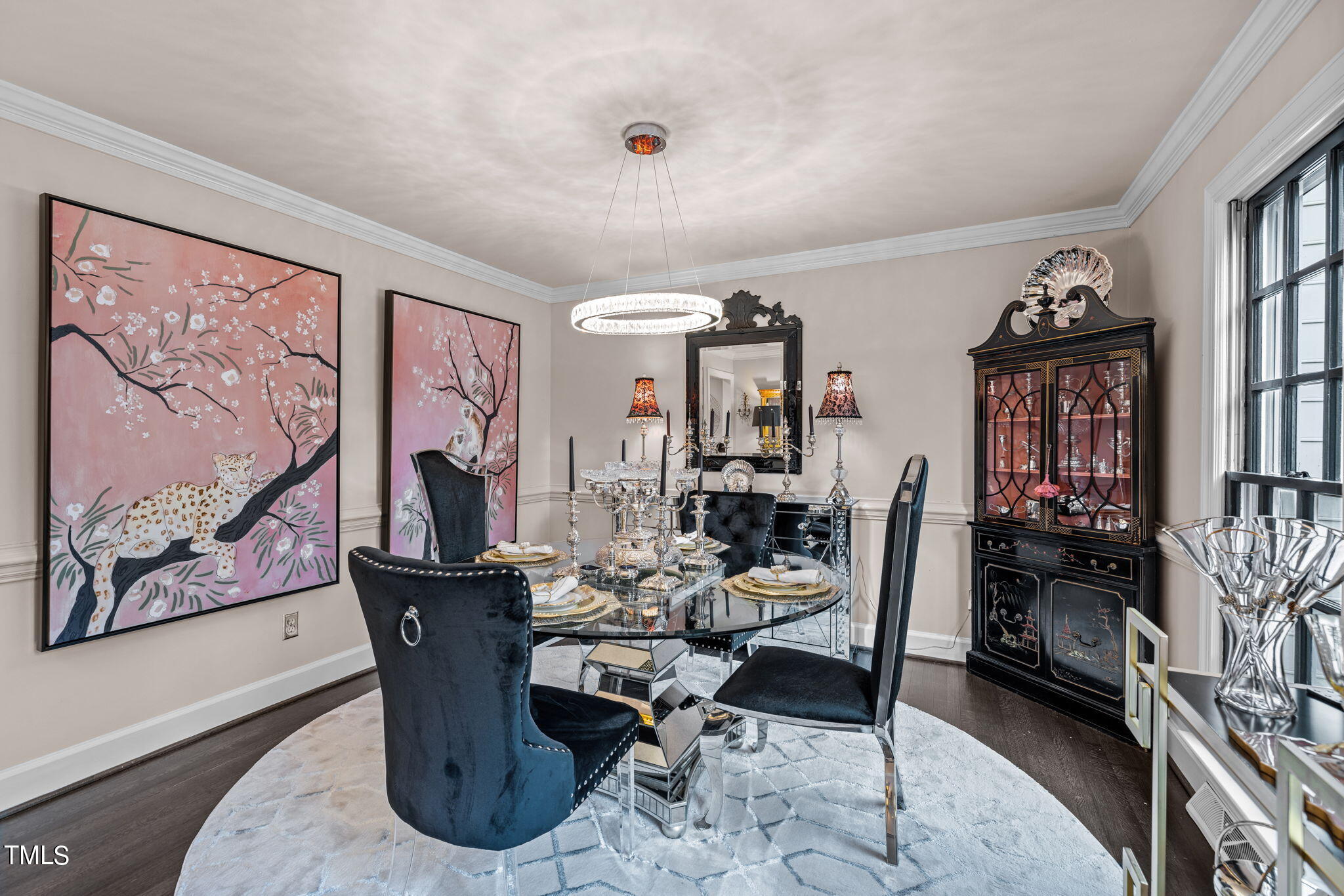 7201 Birchbark Court Raleigh, NC 27615 - Photo 31 of 52 a dining room with furniture and wooden floor