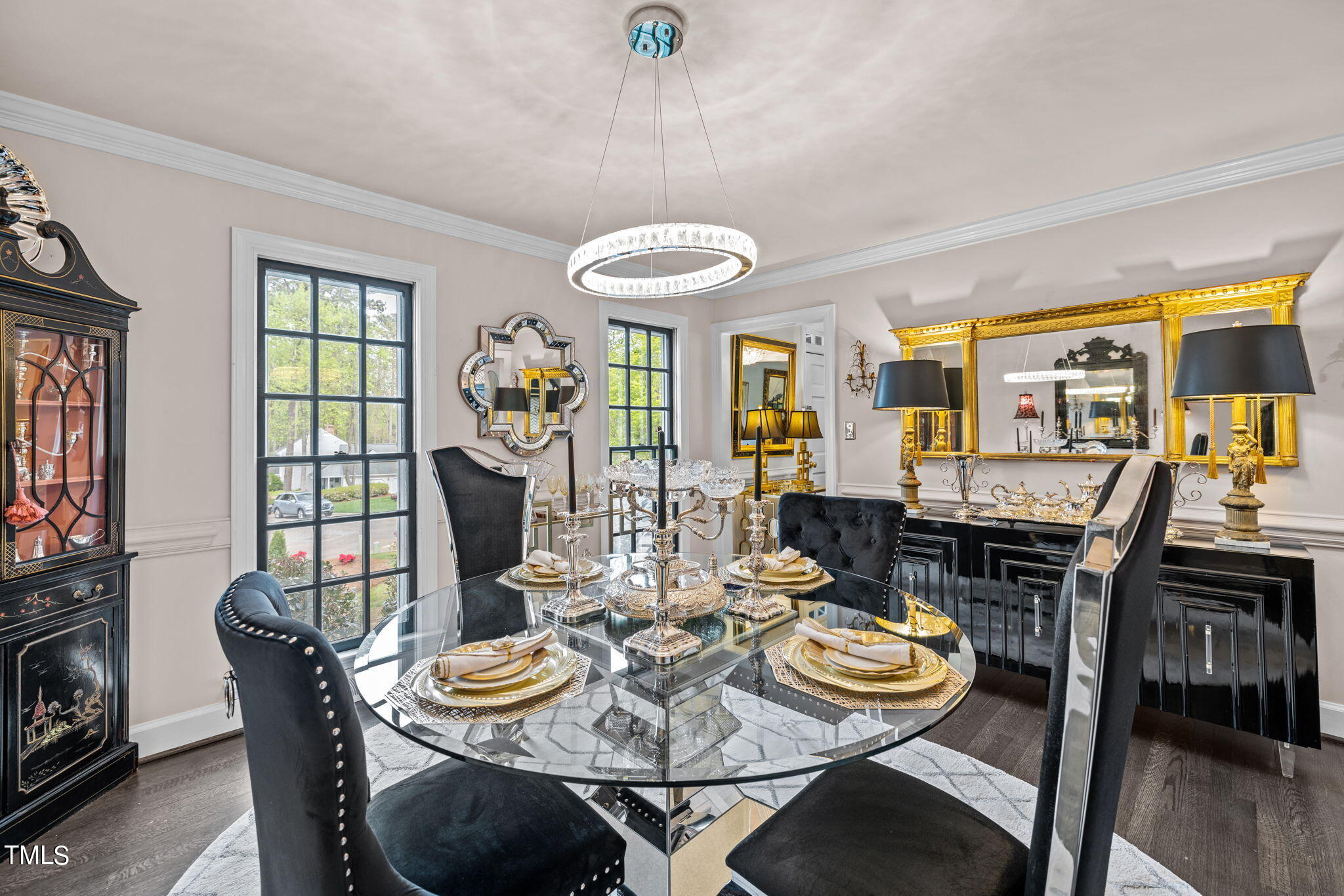 7201 Birchbark Court Raleigh, NC 27615 - Photo 32 of 52 a view of a dining room with furniture window and wooden floor