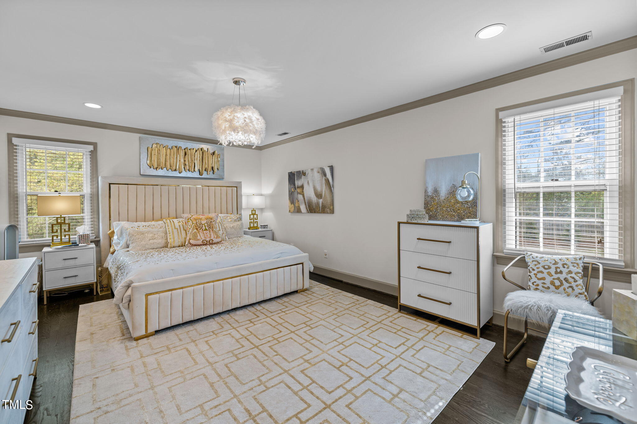 7201 Birchbark Court Raleigh, NC 27615 - Photo 34 of 52 a spacious bedroom with a bed and a couch