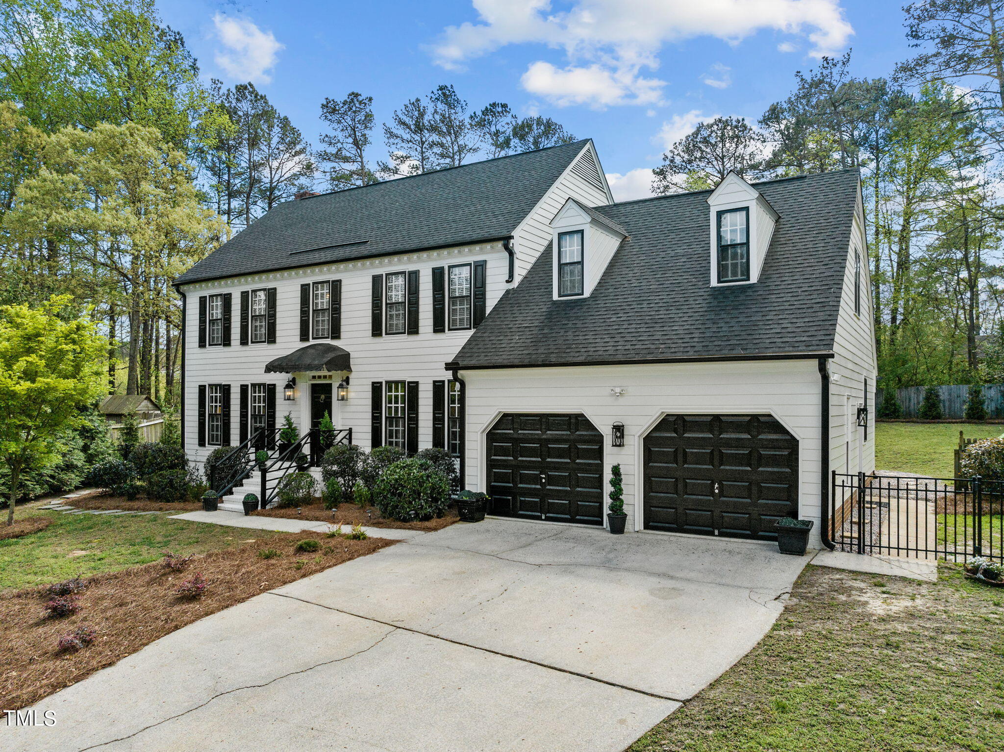 7201 Birchbark Court Raleigh, NC 27615 - Photo 4 of 52 front view of a house with a yard
