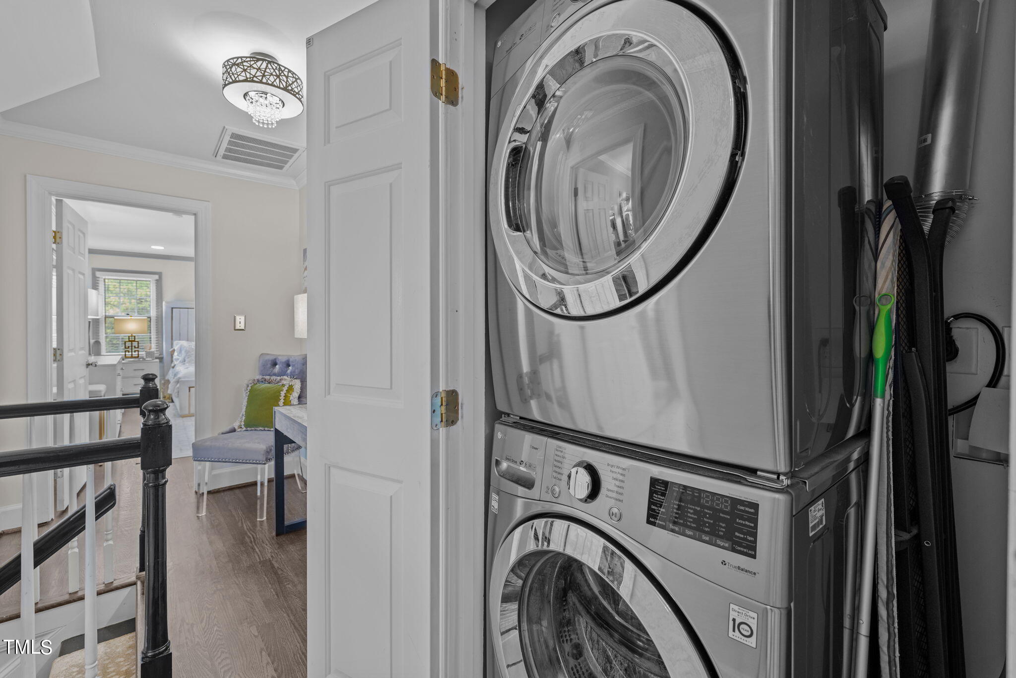 7201 Birchbark Court Raleigh, NC 27615 - Photo 41 of 52 a utility room with dryer and washer