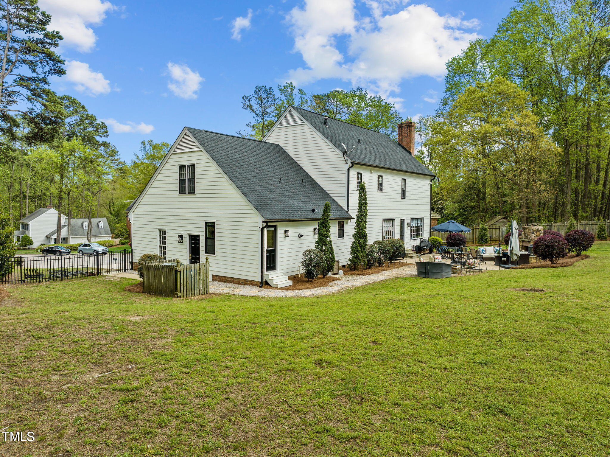 7201 Birchbark Court Raleigh, NC 27615 - Photo 48 of 52 a view of a house with backyard porch and sitting area