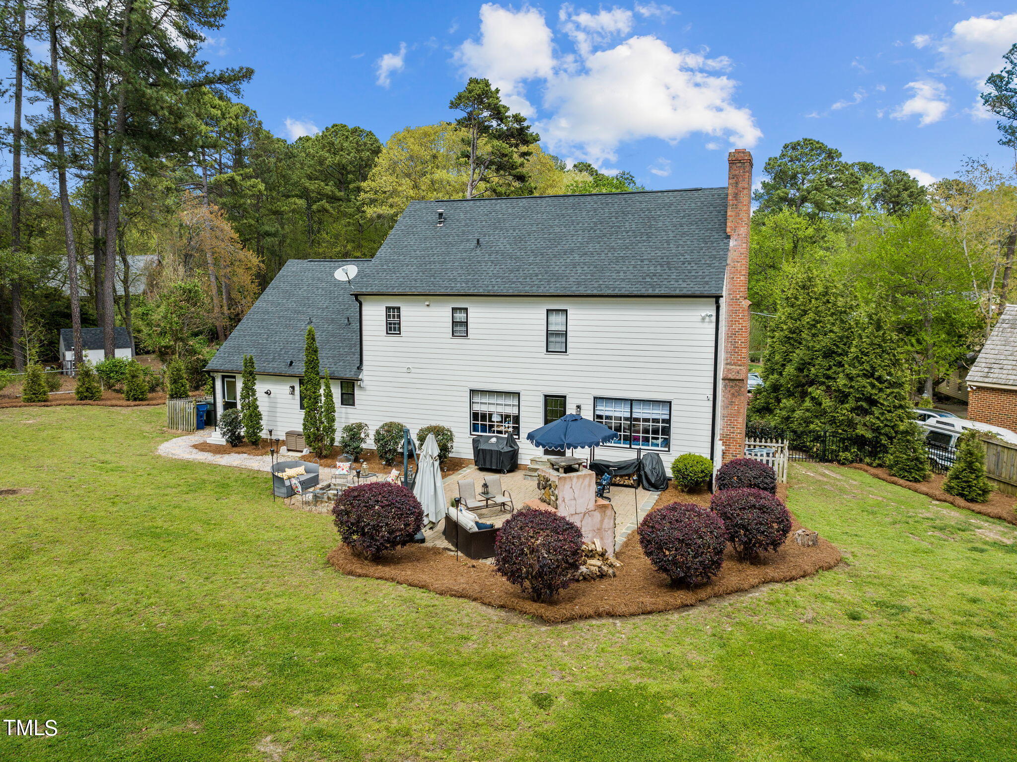 7201 Birchbark Court Raleigh, NC 27615 - Photo 50 of 52 a view of a house with backyard porch and sitting area