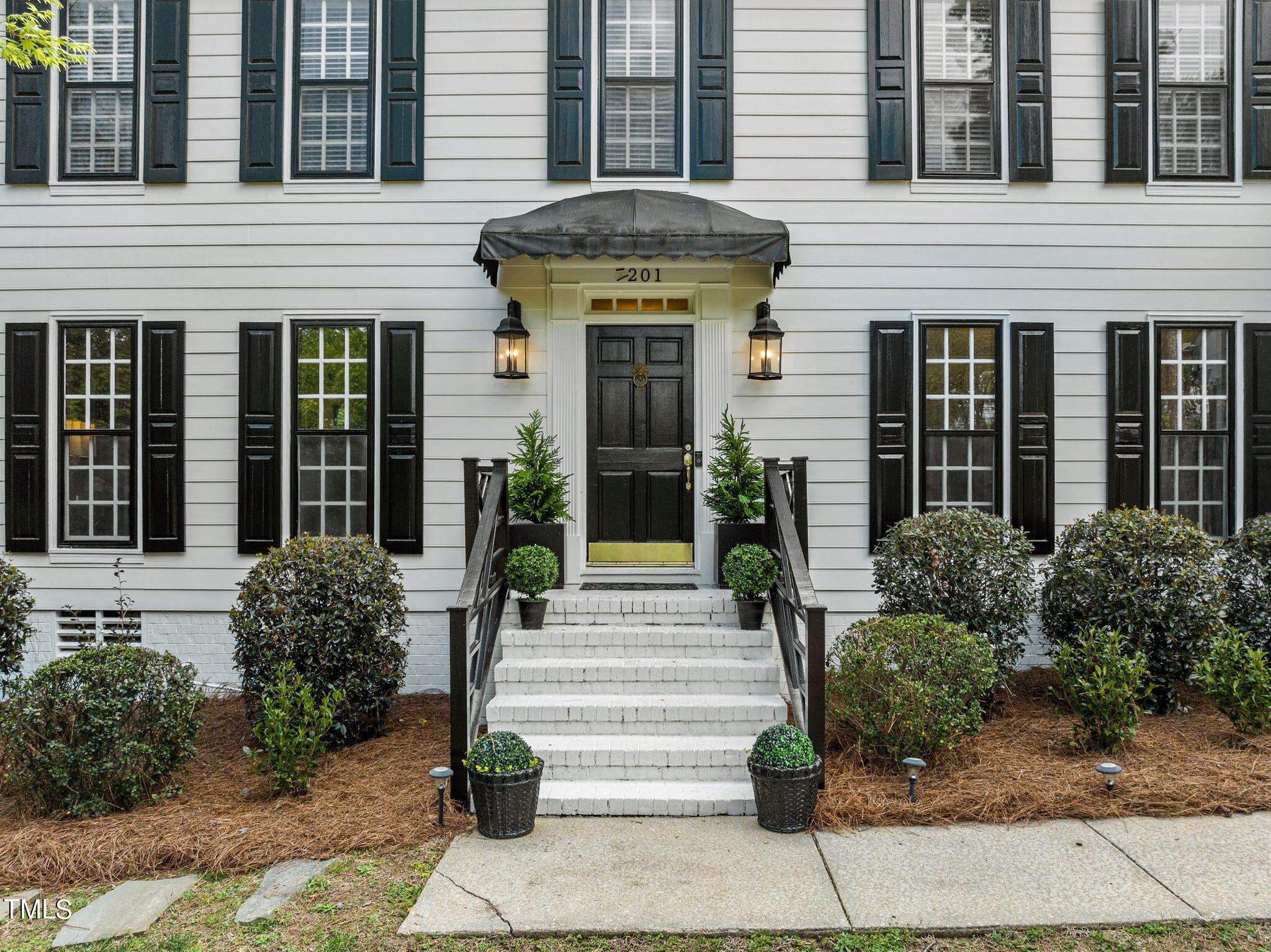 7201 Birchbark Court Raleigh, NC 27615 - Photo 5 of 52 a front view of a house