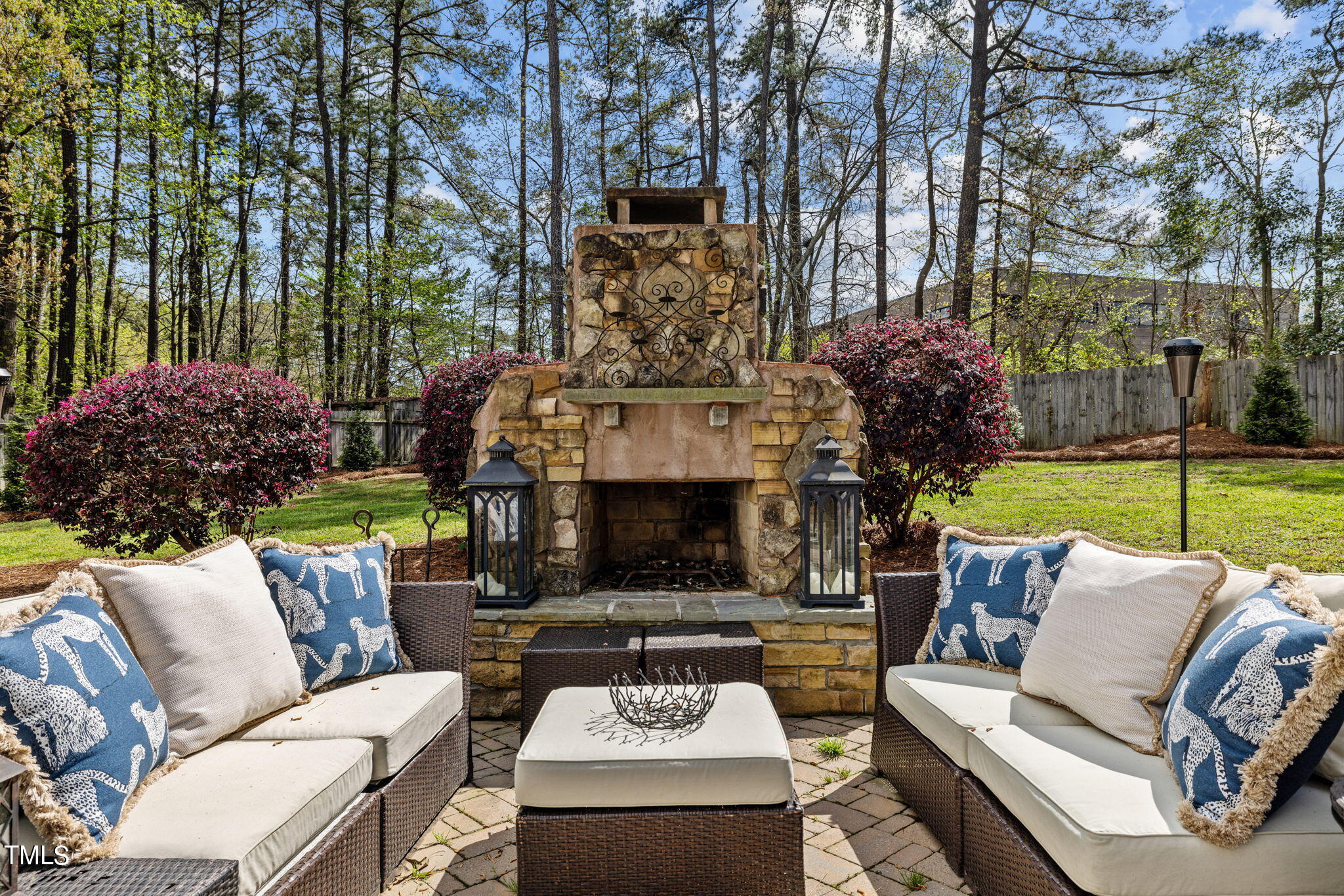 7201 Birchbark Court Raleigh, NC 27615 - Photo 9 of 52 a view of a patio with couches fire pit and a big yard