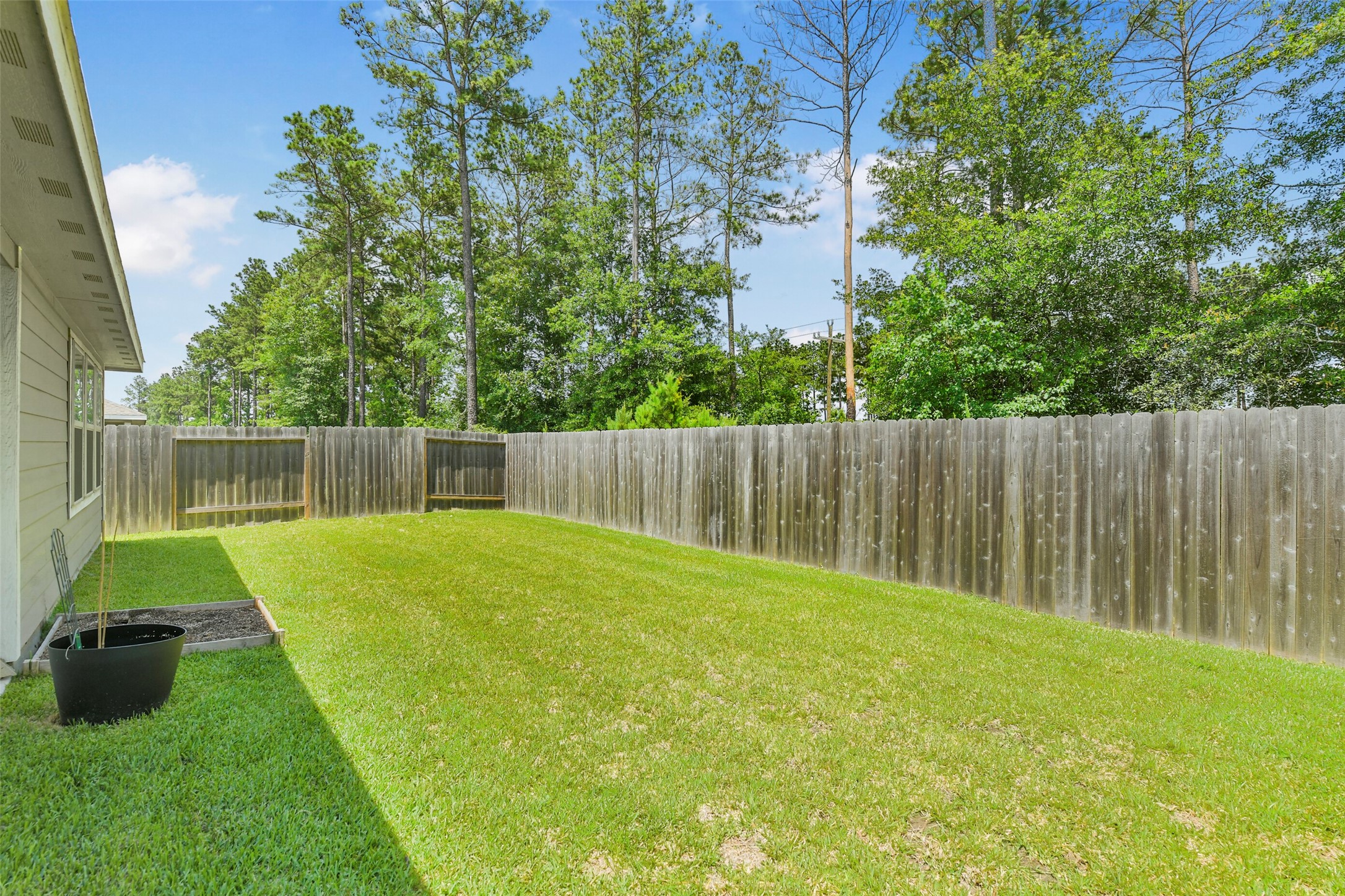 13978 Manatee Street Splendora, TX 77372 - Photo 33 of 39 Private backyard with no rear neighbors.