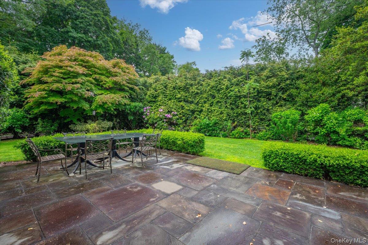 7 Harcourt Road Scarsdale, NY 10583 - Photo 29 of 34 a view of an outdoor space with seating