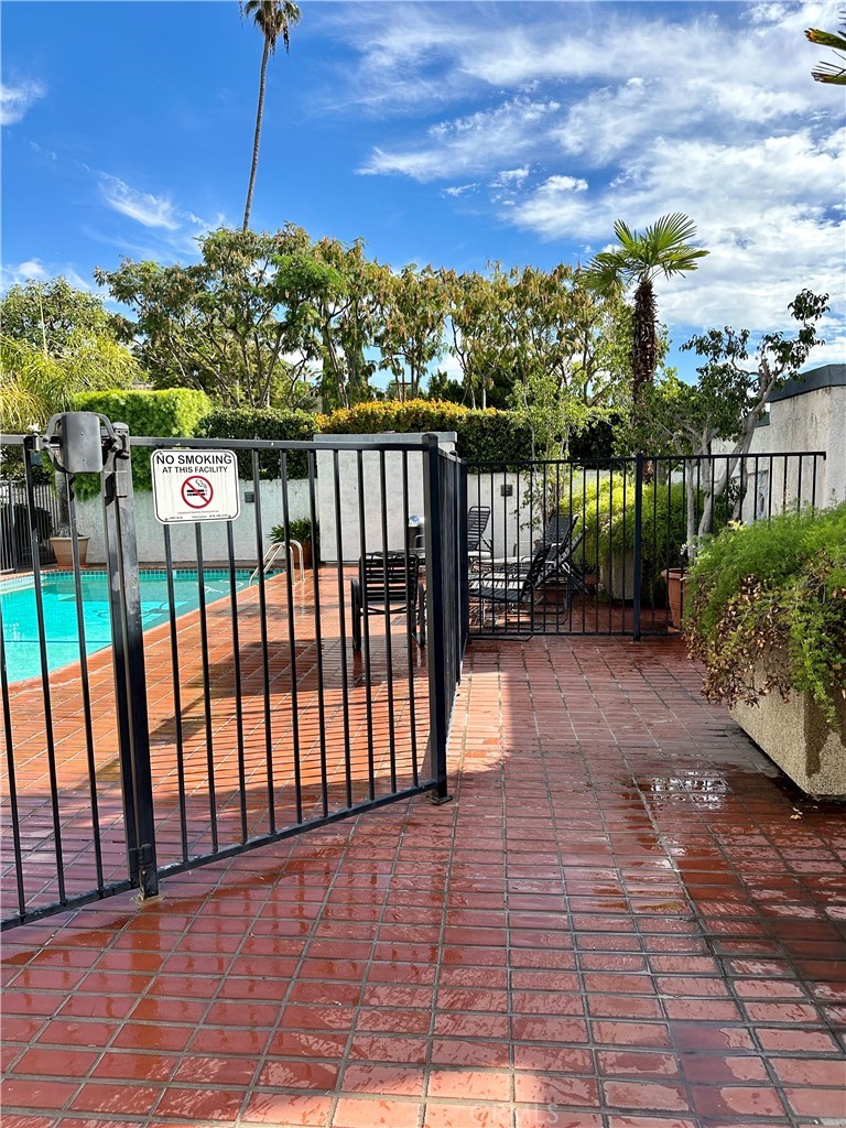 1333 Valley View Road, Unit 18 Glendale, CA 91202 - Photo 51 of 52 a view of a balcony with wooden floor