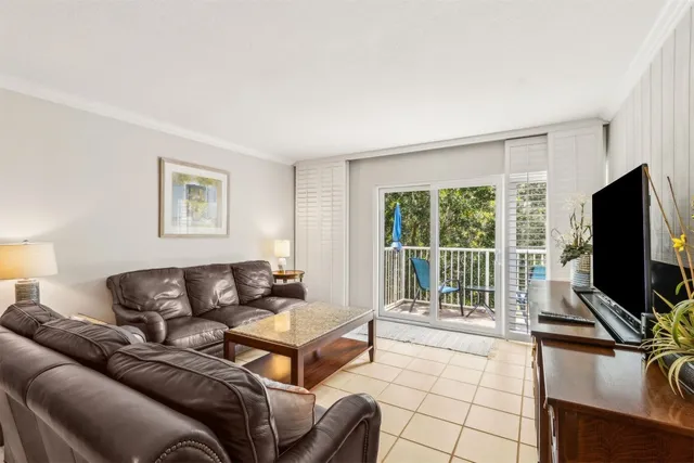 a view of a backyard with swimming pool