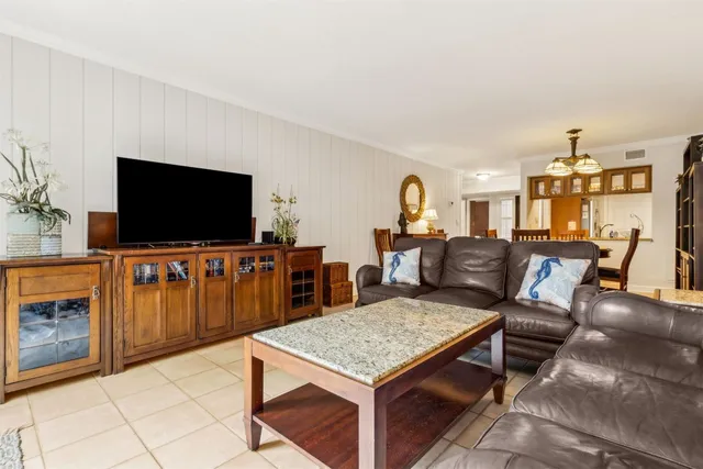 a view of swimming pool with a yard and sitting space