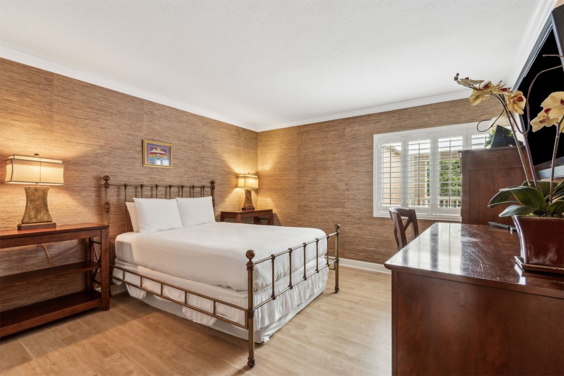 2123 Beachwood Road, Unit 2123 Fernandina Beach, FL 32034 - Photo 24 of 64 a bedroom with a bed and a flat screen tv