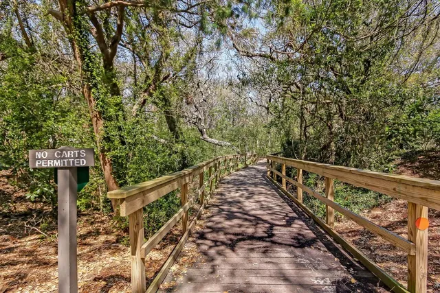 a front view of a house with a yard and porch
