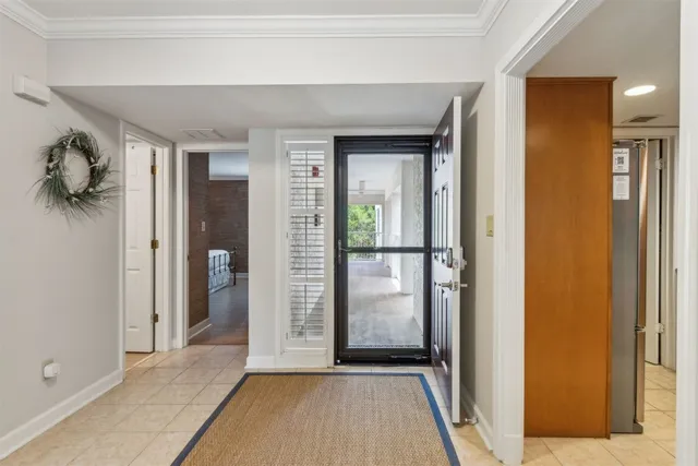a kitchen with stainless steel appliances granite countertop a sink and dishwasher with white cabinets