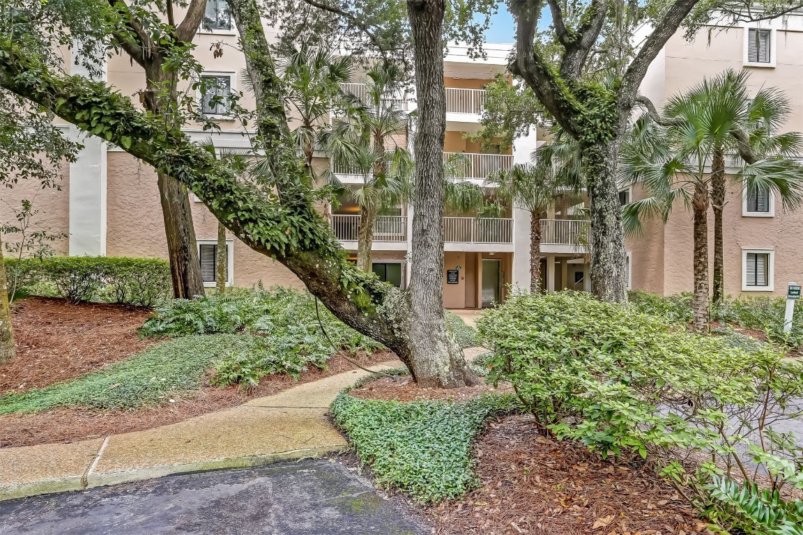 2123 Beachwood Road, Unit 2123 Fernandina Beach, FL 32034 - Photo 64 of 64 a view of a building with a garden